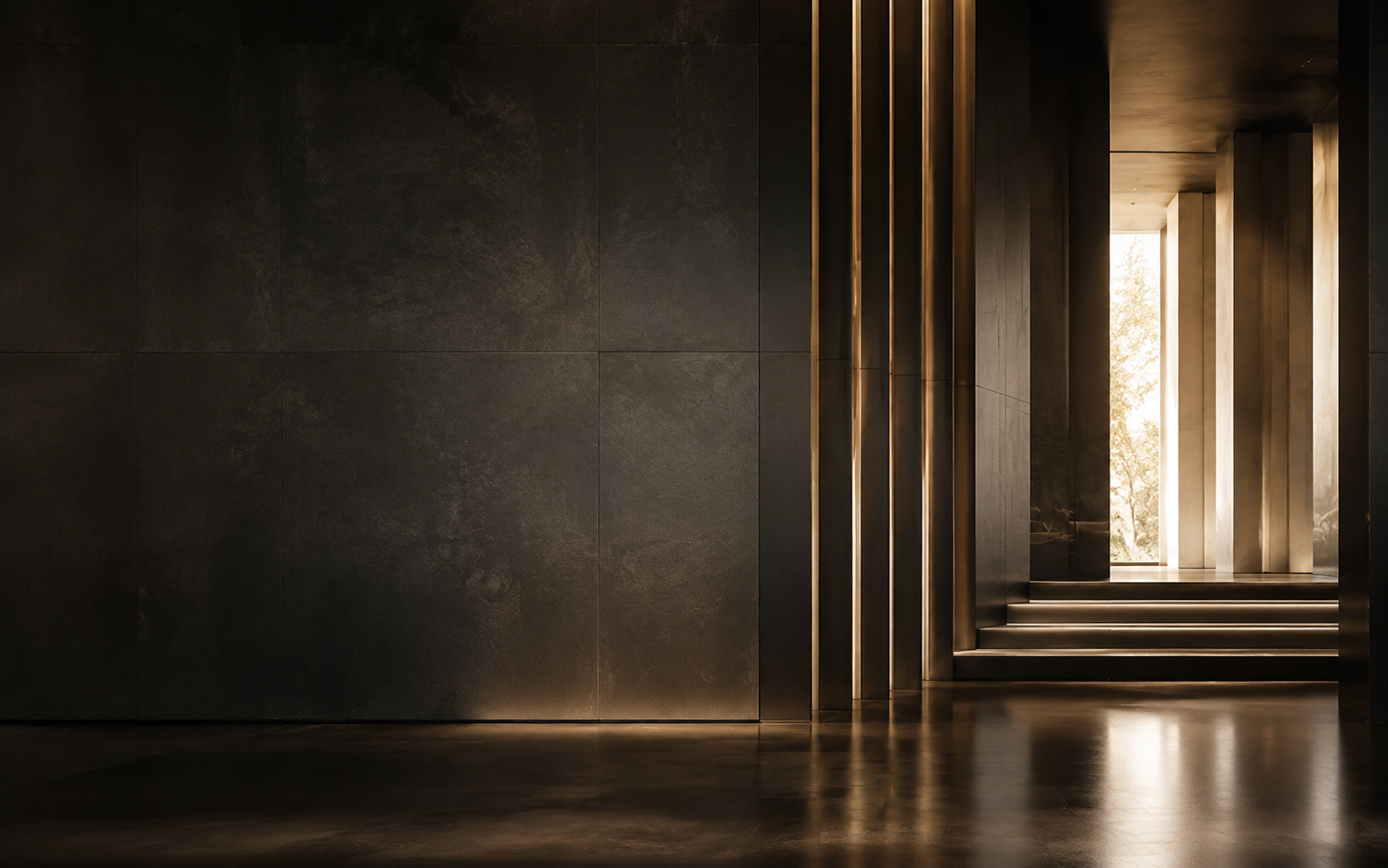 Arquitetura contemporânea em pedra escura e metal dourado